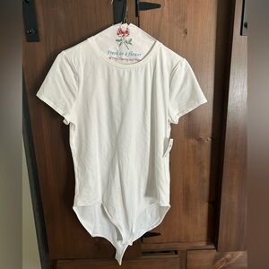 NEW WITH TAGS! GAP bodysuit in white.